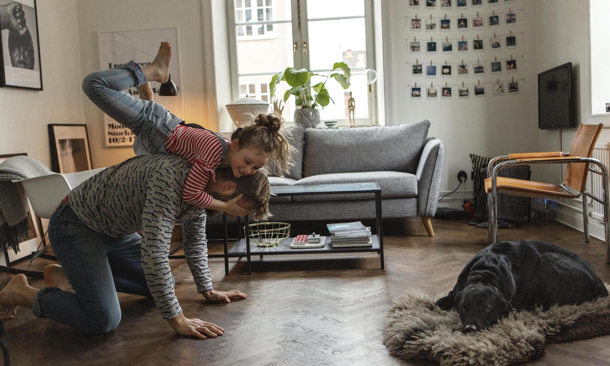 Parent and child playing inside